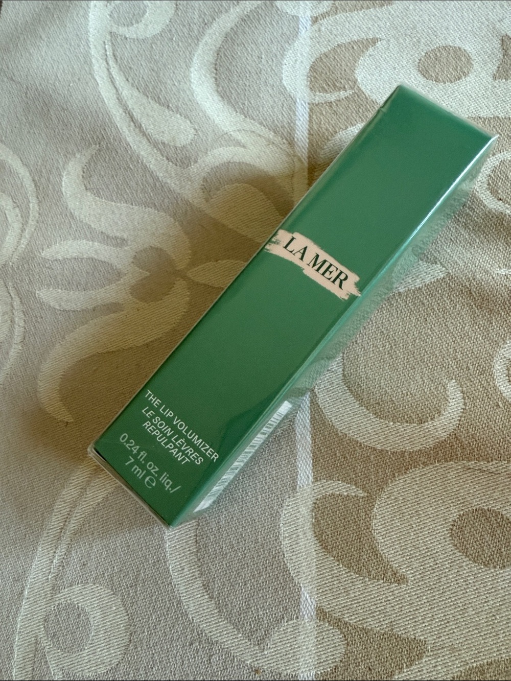 La Mer Lip Volumizer in Green Packaging